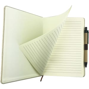 A cotton notebook with a beige cover, featuring lined pages and a black pen attached.
