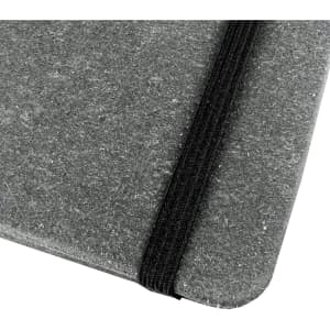 A grey notebook with a textured cover and a black elastic band closure. Features a logo on the cover.