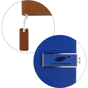 A blue notebook featuring a textured cover and a brown tag, along with a silver branding logo.