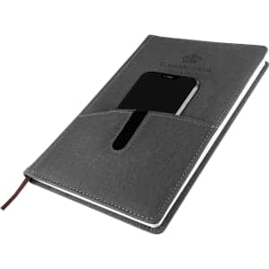 A grey notebook with a phone pocket and a ribbon marker, featuring a logo on the cover.