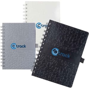 A set of three spiral-bound notebooks in grey, white, and black, each featuring a logo on the front cover.