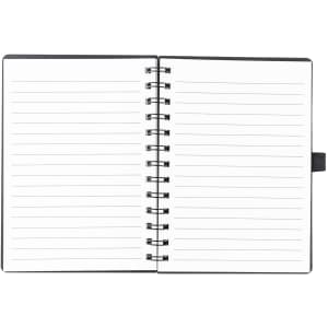 A spiral-bound notebook with a black cover and blank lined pages inside. It features a bookmark and has no printed text.