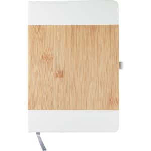 A notebook with a bamboo cover and white accents, featuring a grey ribbon bookmark.