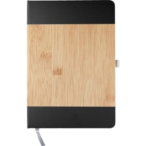A notebook with a bamboo cover and black accents, featuring a ribbon bookmark and a logo.