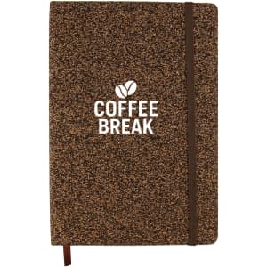 A brown A5 notebook with a textured cover and an elastic band, featuring a logo on the front.