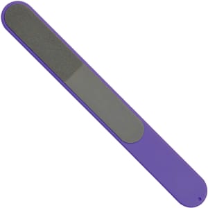 A purple nail file with a textured surface on one side and a smooth side for nail care.