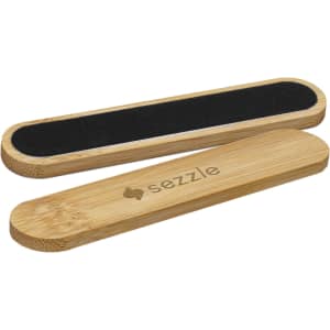 A bamboo nail file featuring a textured black sanding surface and an engraved logo, showcasing a natural wood finish.
