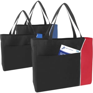 Three nylon shopper tote bags in black, blue, and red, each featuring a front pocket. Some have materials tucked inside.