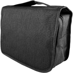A grey toiletry bag with a handle and zippered compartments, featuring a simple design and a branding logo.