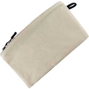 A large beige cosmetic bag with a zipper closure and a small loop attachment. It features a plain design.