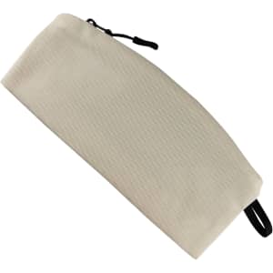 A medium, cream-coloured cosmetic bag with a black zipper and a loop handle. It features a logo.