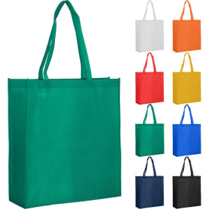A green extra large non-woven reusable grocery bag with two handles, displayed alongside bags in various colours.