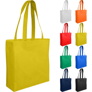 A yellow reusable grocery bag with two handles, displayed alongside bags in various colours including white, orange, red, yellow, green, and navy.