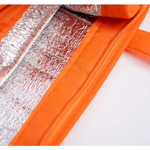 An orange non-woven cooler bag with a reflective silver interior and a top zip closure. It has a handle and branding.
