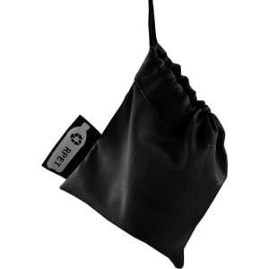 A black shower poncho compactly packed in a small drawstring pouch with a branding label.