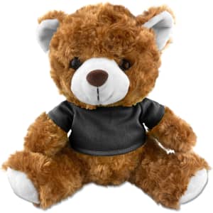 A brown teddy bear plush toy with a black shirt, featuring a cute face and soft fur. It has a logo on its shirt.