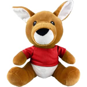 A soft, brown kangaroo plush toy wearing a red shirt and white bottom, featuring large ears and a friendly smile.