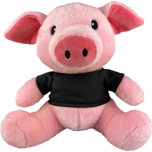 A pink pig plush toy with a black shirt and a friendly expression. It has large eyes and soft features.