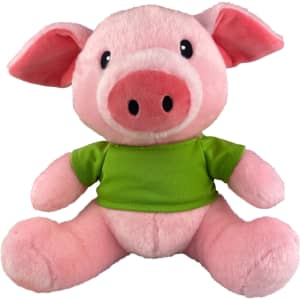 A pink plush pig with a green shirt, featuring large eyes and soft ears, sitting upright.