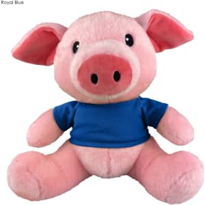 A pink plush pig toy wearing a blue shirt, featuring large ears and a smiling face. It has a logo on the shirt.