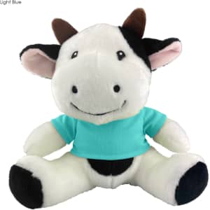A cute black and white cow plush toy wearing a light blue shirt, featuring a friendly smile and soft features.