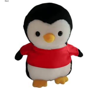 A plush penguin toy with a black and white body, yellow beak, and wearing a red shirt. It has black buttons for eyes.