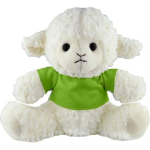 A fluffy sheep plush toy in white, wearing a bright green shirt, with black button eyes and stitched details.