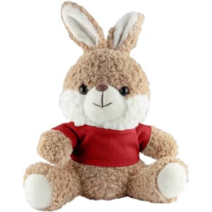 A brown and cream rabbit plush toy with floppy ears, wearing a red shirt, seated with a friendly expression.