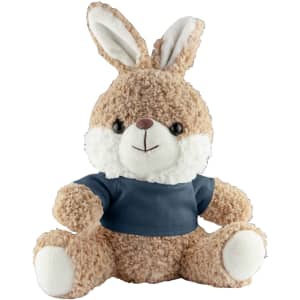 A soft brown rabbit plush toy with white accents and a blue shirt, sitting upright with a friendly expression.