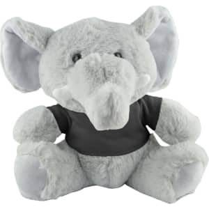 A grey plush elephant with large ears and a grey shirt, seated and looking forward. It has a simple design and soft texture.