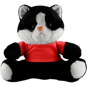 A plush cat toy in black and white with a red shirt, featuring large eyes and a seated position. It has a logo on it.