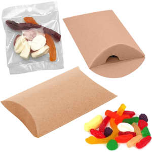 A pillow-shaped package containing assorted jelly lollies in various colours, accompanied by additional lollies on a surface.