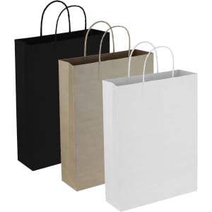 A set of three paper trade show bags in black, brown kraft, and white, each with handles.