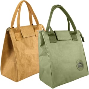 A brown lunch bag and a green lunch bag with handles, featuring a logo on the green bag.