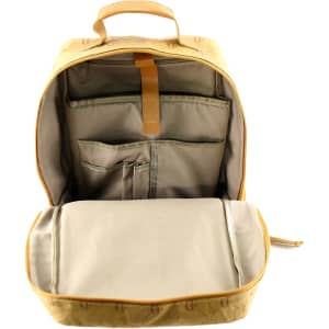 A kraft paper laptop backpack in light brown with multiple compartments and a beige interior. Features a simple branding logo.