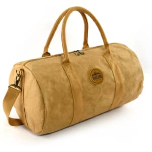 A tan Kraft paper duffle bag with dual handles and a shoulder strap, featuring a circular logo.