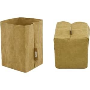 A small storage bag made of kraft paper, featuring a simple design in a light brown colour with a logo.
