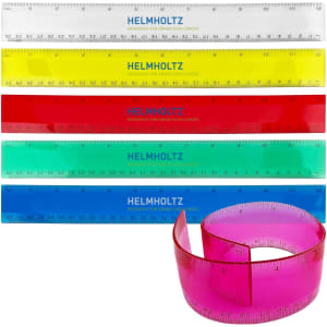 Five PVC soft plastic rulers in white, yellow, red, green, and blue, alongside a pink flexible ruler. Each has a logo.