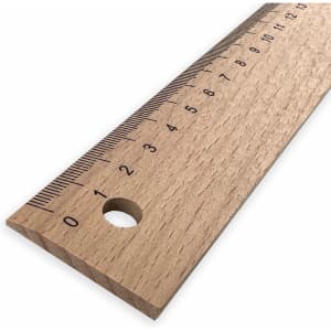 A wooden 20cm ruler with measurement markings in black and a hole for hanging, featuring a light wood finish.