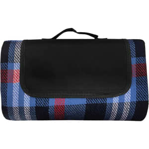 A folded picnic blanket featuring a blue, red, and black plaid design, with a black carrying handle.