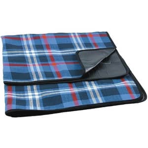 A blue and plaid picnic blanket featuring a black waterproof backing and a folded corner. It has a logo.