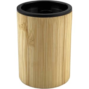 A bamboo pencil sharpener featuring a cylindrical design with a black top and natural bamboo texture.