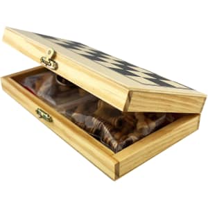 A wooden play case with a geometric design, opened to reveal various game pieces inside. The case is light-coloured.
