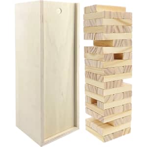 A large wooden Jenga set with a stacking tower of light-coloured blocks and a matching storage box.