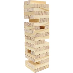 A large Jenga set made of light wood blocks, stacked vertically in a tower formation.