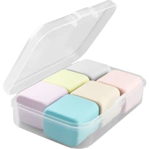 A clear plastic case containing six pastel-coloured rubber erasers in various shapes.