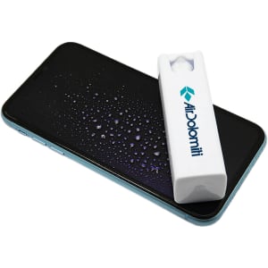 A white spray cleaner sits on a smartphone screen with water droplets, featuring a logo on the cleaner.