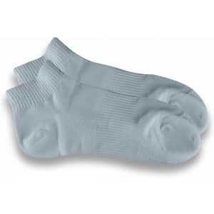 A pair of light blue ankle grip socks with a textured pattern and a ribbed cuff. Features a logo.