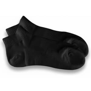 A pair of black ankle grip socks with textured detailing and a logo on one sock.