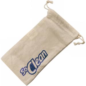 A cotton drawstring pouch in off-white featuring a logo. The pouch has ties at the top for closure.